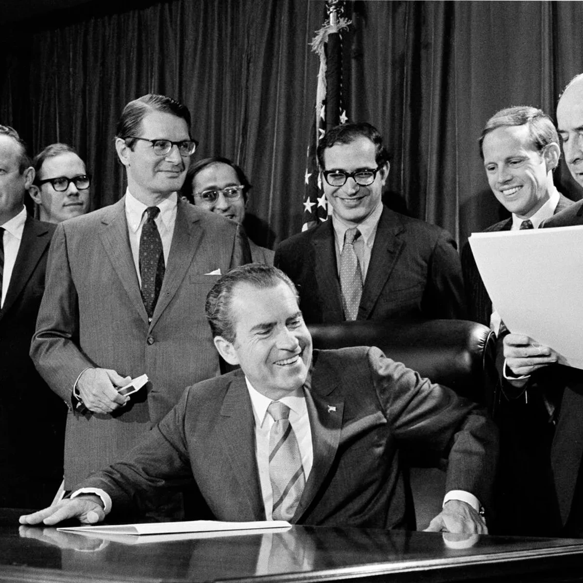 nixon and comrades signing bill